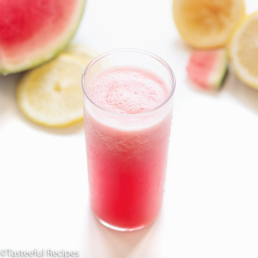 Angled shot of a glass of frozen watermelon lemonade