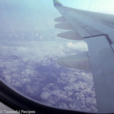 A shot of clouds from an airplane window